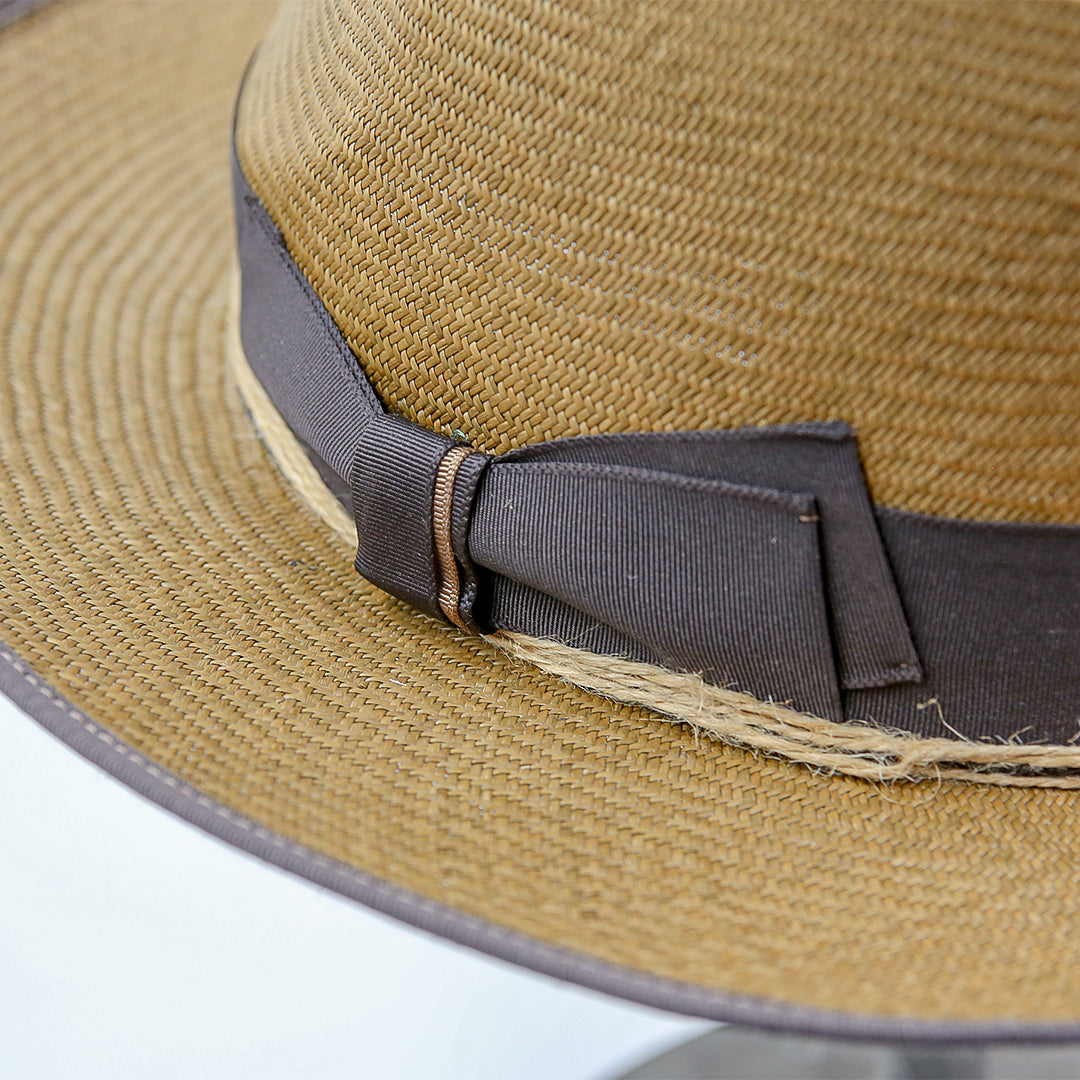 Darker straw hat, dark brown ribbon, with twine wrap