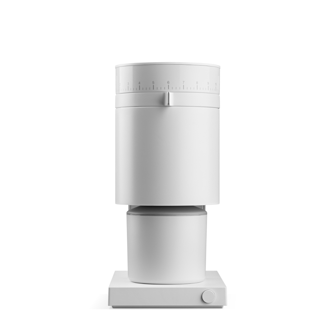 The Fellow Opus coffee grinder with a white finish.