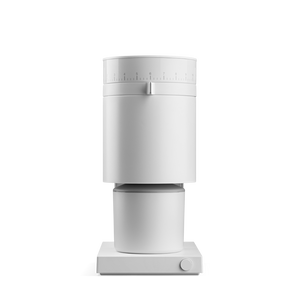 The Fellow Opus coffee grinder with a white finish.