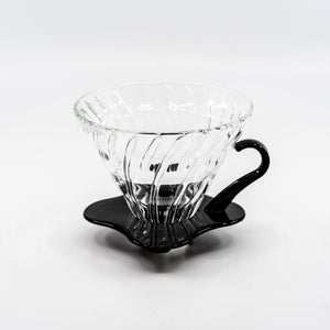 Hario V60 glass 02 brewer with black base.