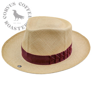 Straw hat with red ribbon