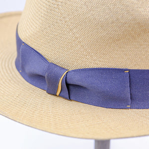 Straw hat, navy blue and gold ribbon, bow