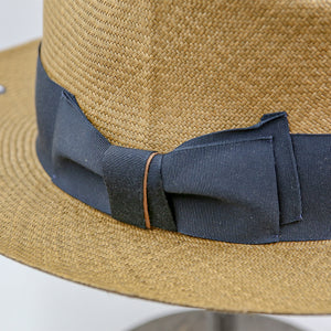 Darker straw hat, wide Deep blue ribbon