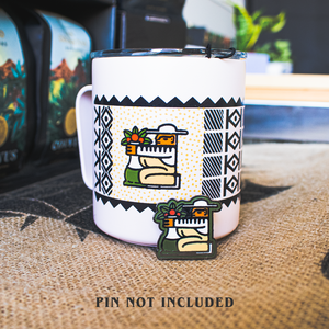 Specialty Coffee Roasters Camp Mug designed by Zaine Vaun depicting a coffee farmer with matching enamel pin leaning against it.