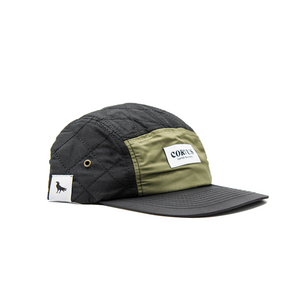 Nylon five-panel baseball hat with tag featuring a crow.