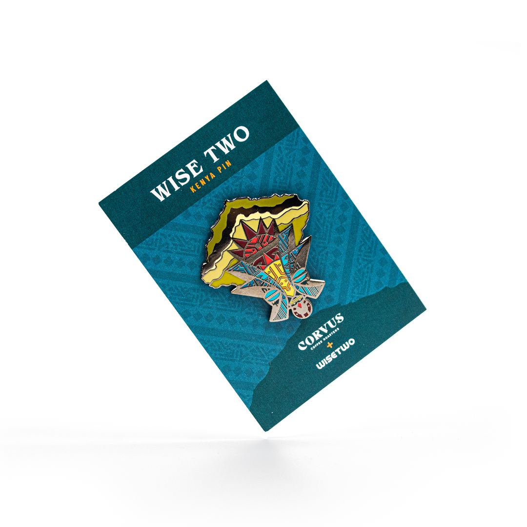 Enamel Pin depicting a mask of African artistic origin.